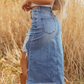 Denim midiskjørt for dame med høyt liv og slitte detaljer
